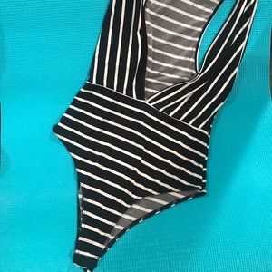 Deep v neck body suit